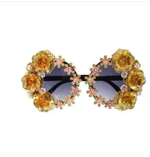 Exaggerated Cat Eye Sunglasses with Floral Design