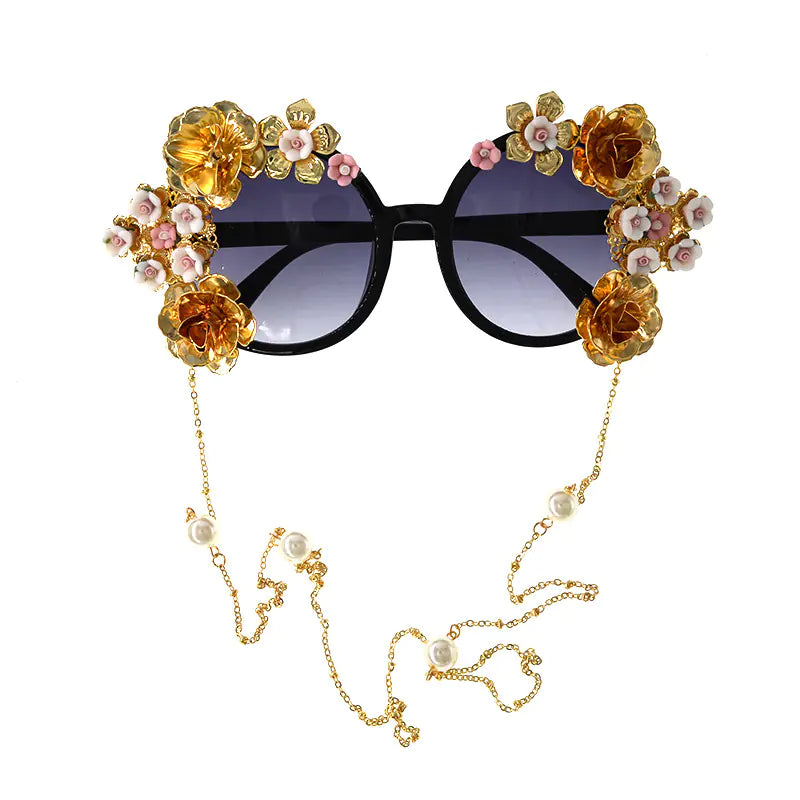 Exaggerated Cat Eye Sunglasses with Floral Design