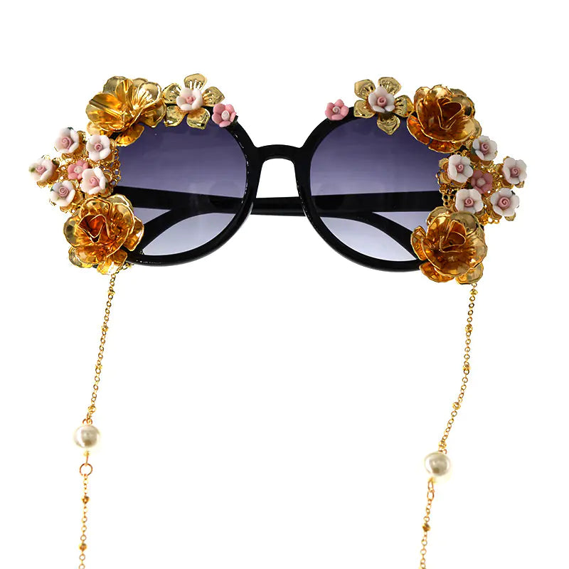 Exaggerated Cat Eye Sunglasses with Floral Design