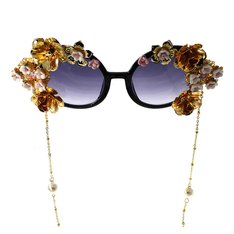 Exaggerated Cat Eye Sunglasses with Floral Design
